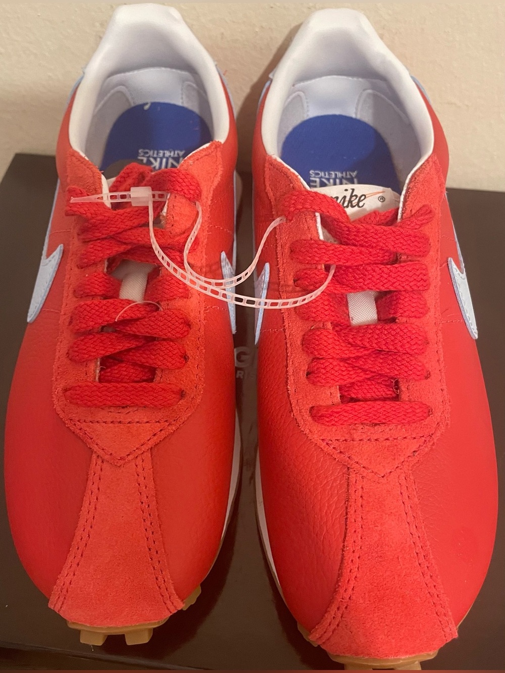 Nike Women’s Red and White Low-Top Sneakers